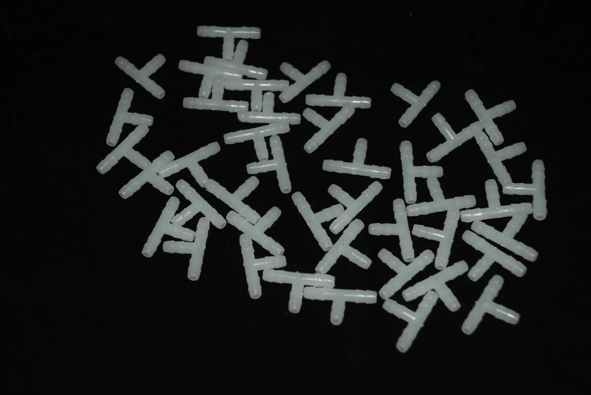 Ken's Barbed White Plastic T 3/16 Inch